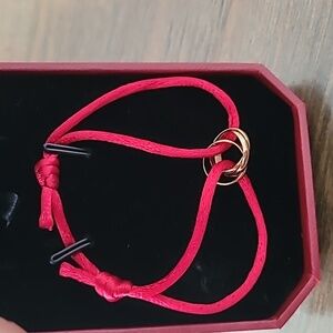 Red silk string with 3 mini rings accent bracelet